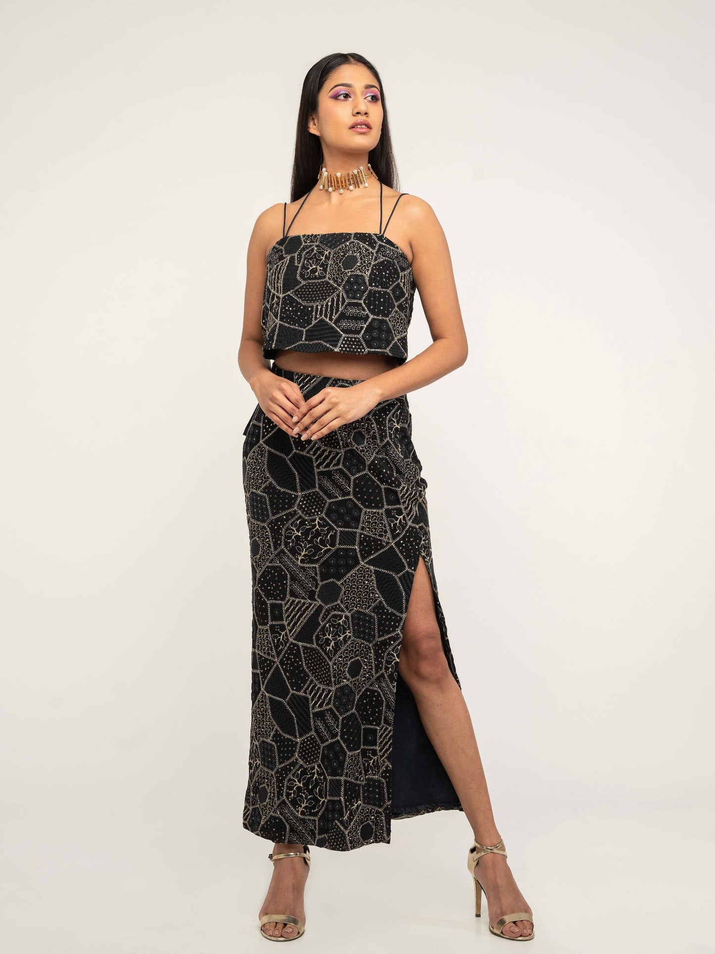 The Amara consists of a high-waisted, elastic waistband skirt with a spaghetti-strapped blouse and a skinny dupatta.