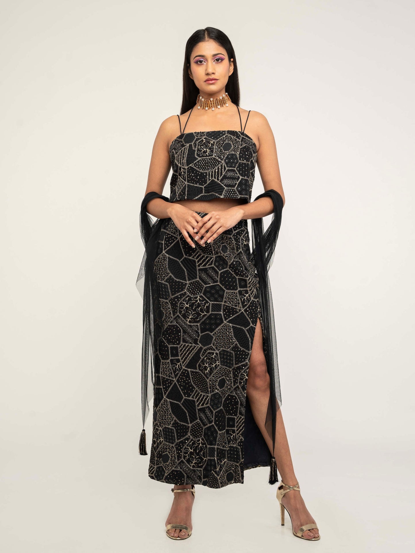 The Amara consists of a high-waisted, elastic waistband skirt with a spaghetti-strapped blouse and a skinny dupatta.