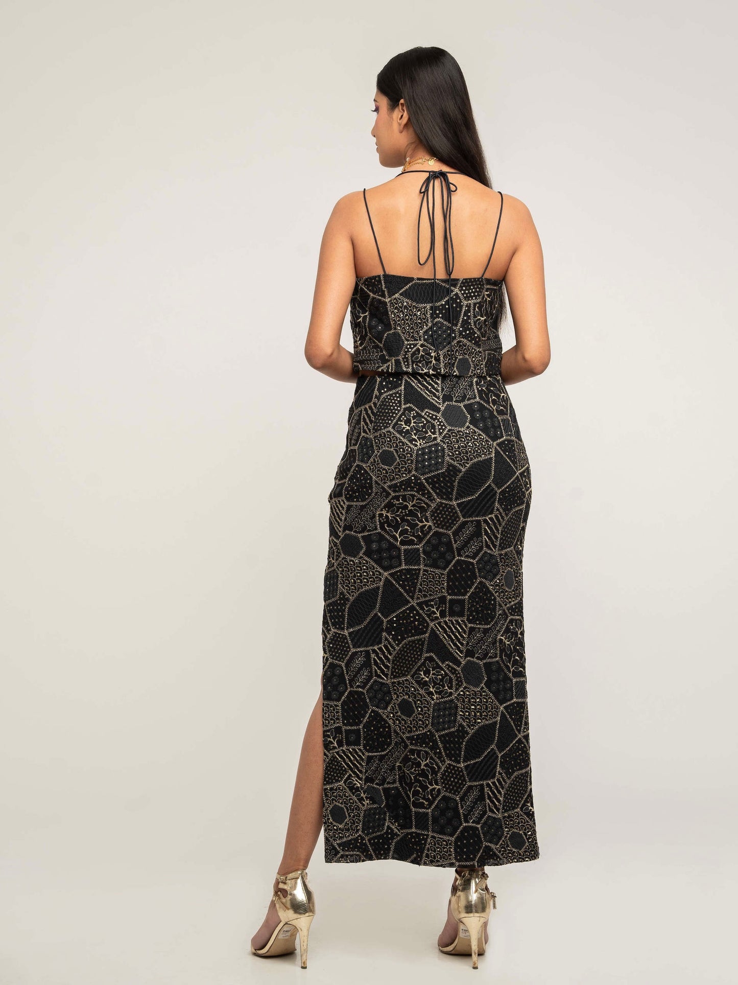 The Amara consists of a high-waisted, elastic waistband skirt with a spaghetti-strapped blouse and a skinny dupatta.