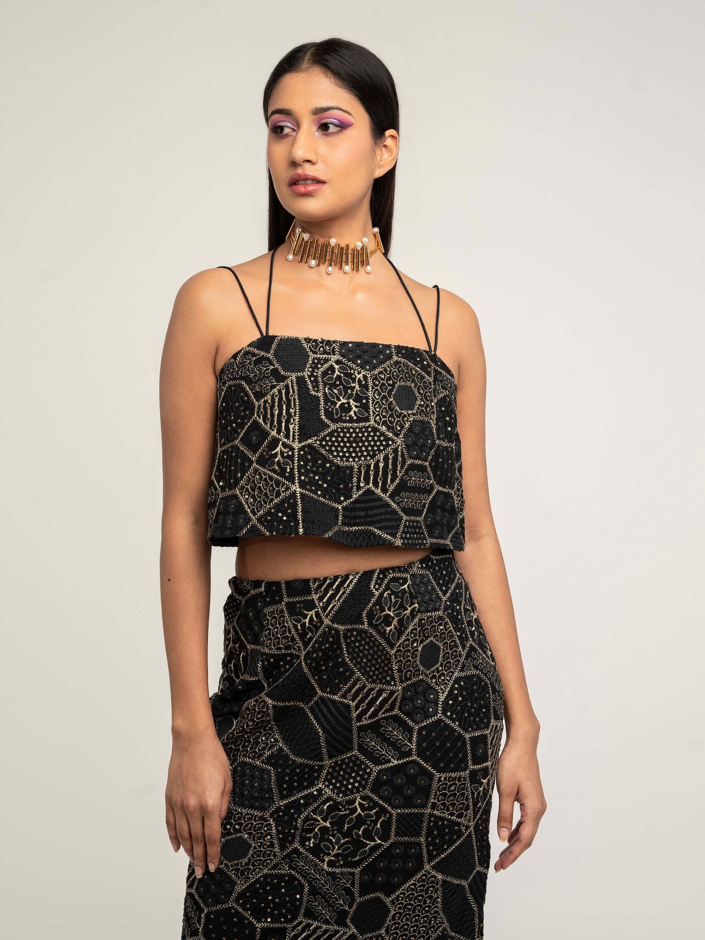The Amara consists of a high-waisted, elastic waistband skirt with a spaghetti-strapped blouse and a skinny dupatta.