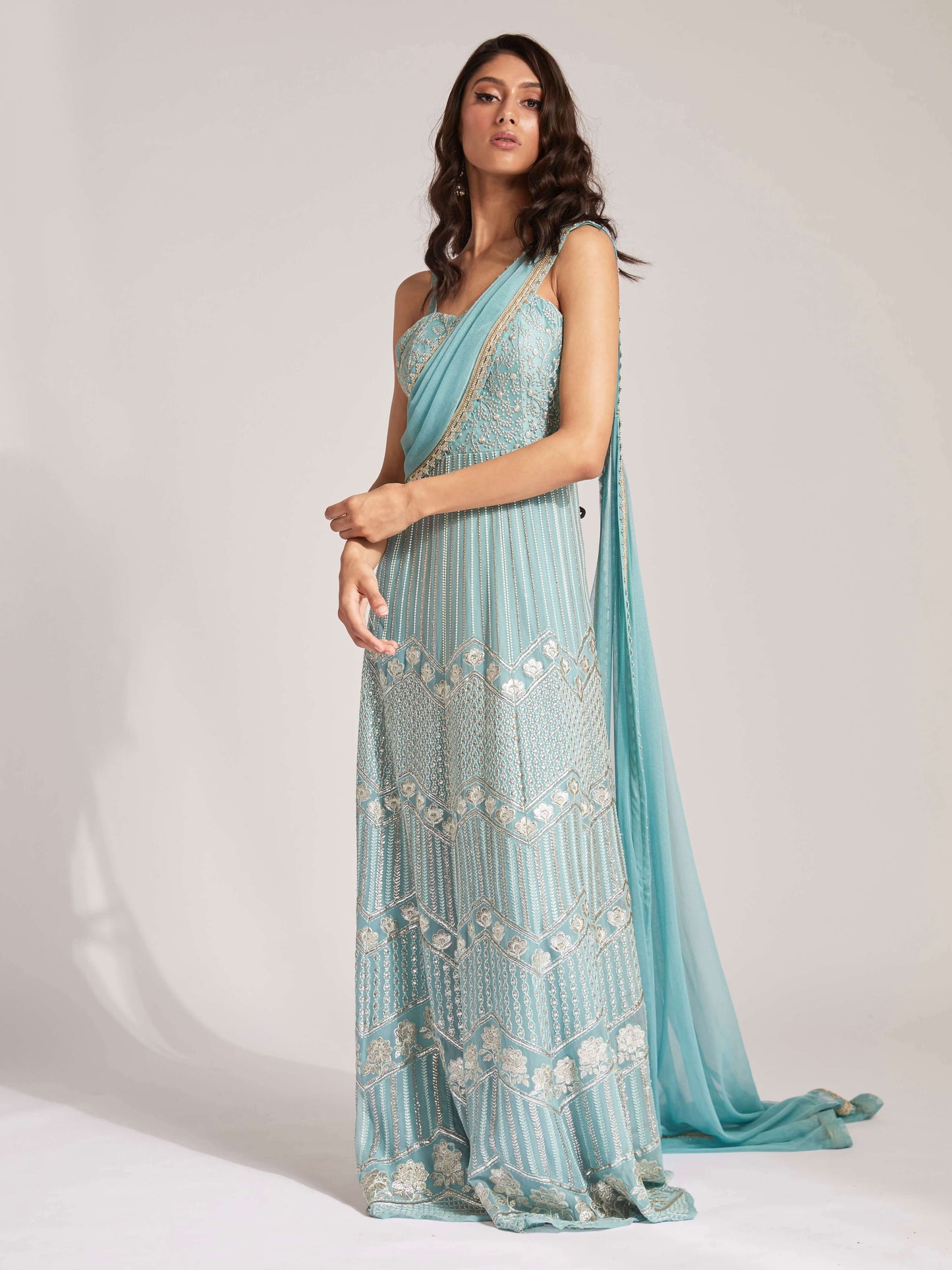 The Anjali Anarkali features metallic layered embroidery and is paired with an attached dupatta (so you can't lose or trip on it).