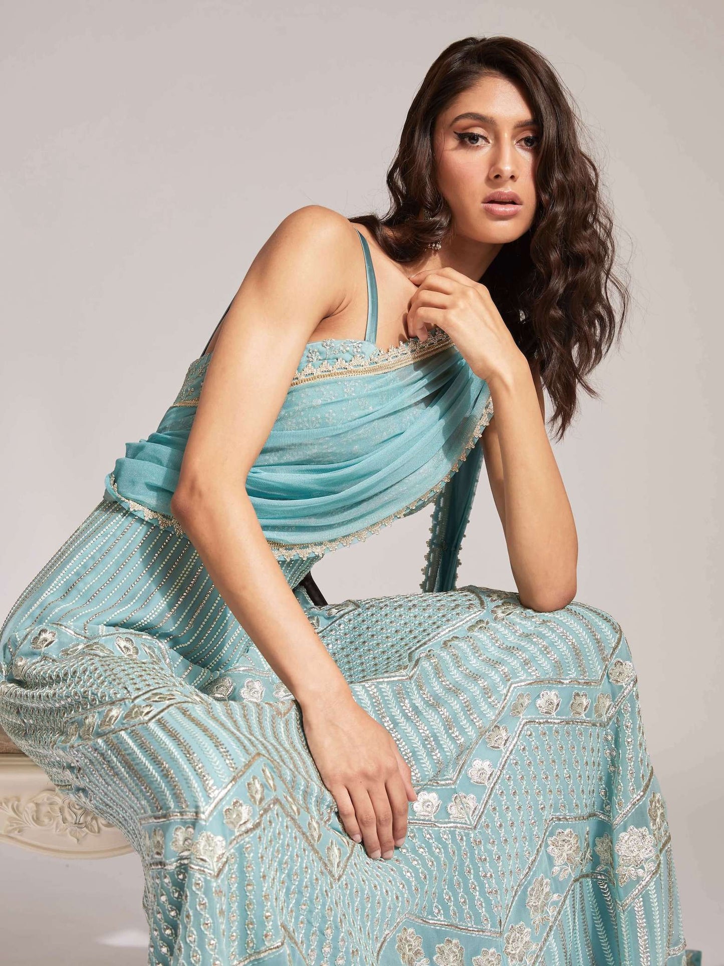 The Anjali Anarkali features metallic layered embroidery and is paired with an attached dupatta (so you can't lose or trip on it).