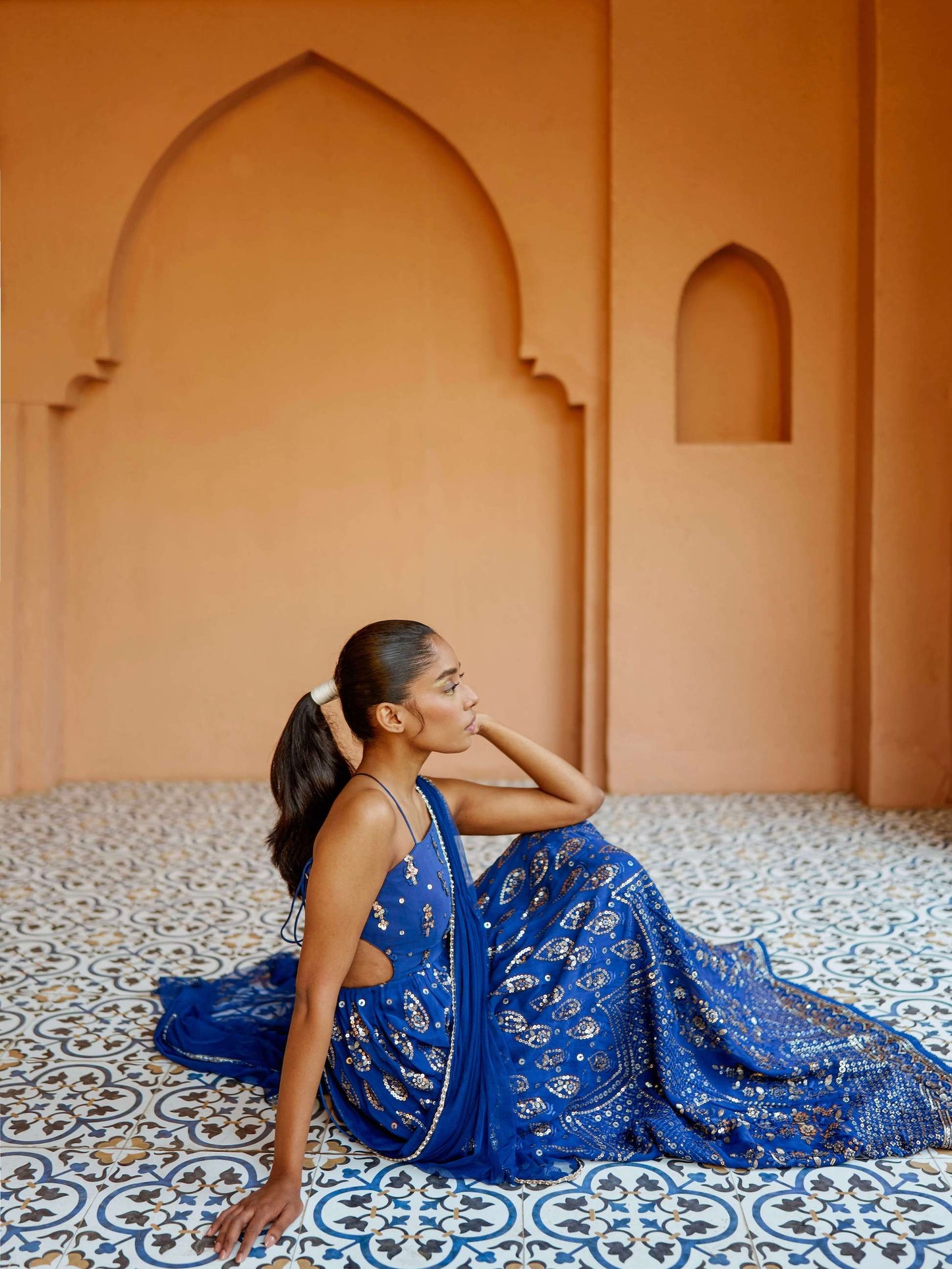 The Cutout Anarkali is an open-back, sequin gown paired with an attached dupatta (so you can't lose or trip on it).