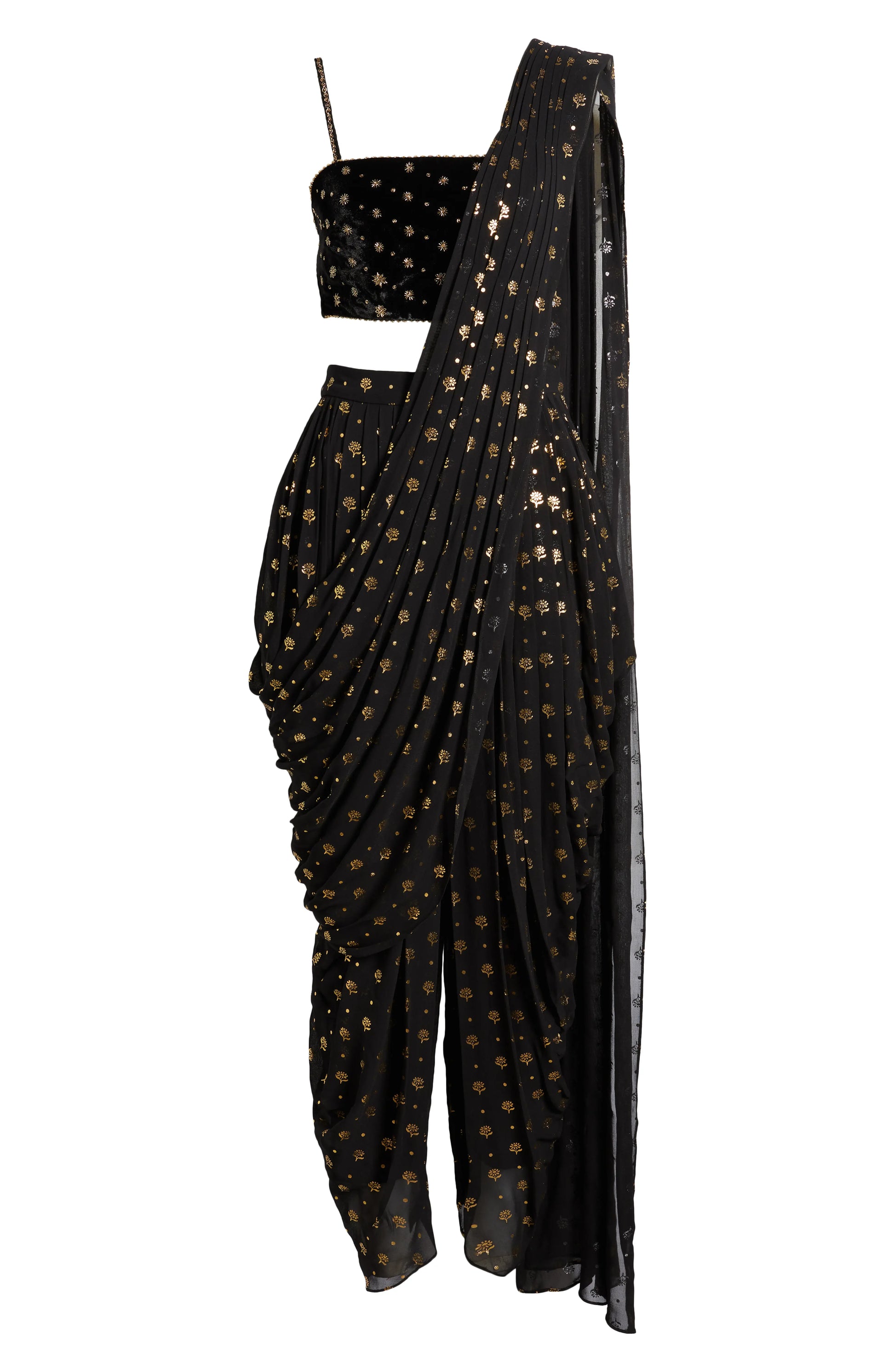 The Farah Dhoti set features a flattering midriff-baring top, flowy dhoti pants made for dancing, and an attached dupatta that drapes perfectly every time—no pleating, no fuss. The gold foil print adds just the right amount of texture and attention to detail.
