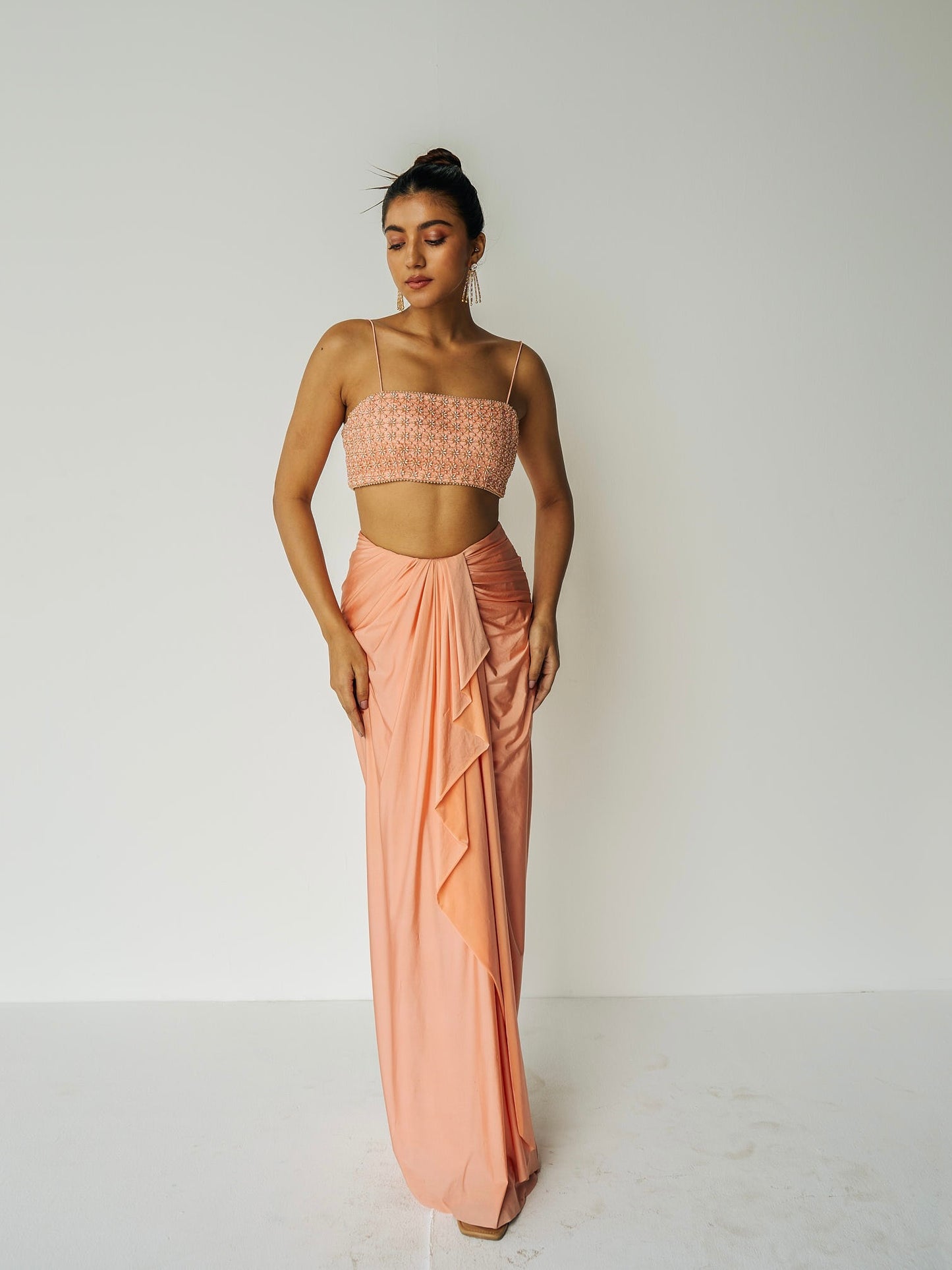 The Pearl Set features a hand embroidered pearl top, gathered skirt and skinny dupatta with pearl detailing.