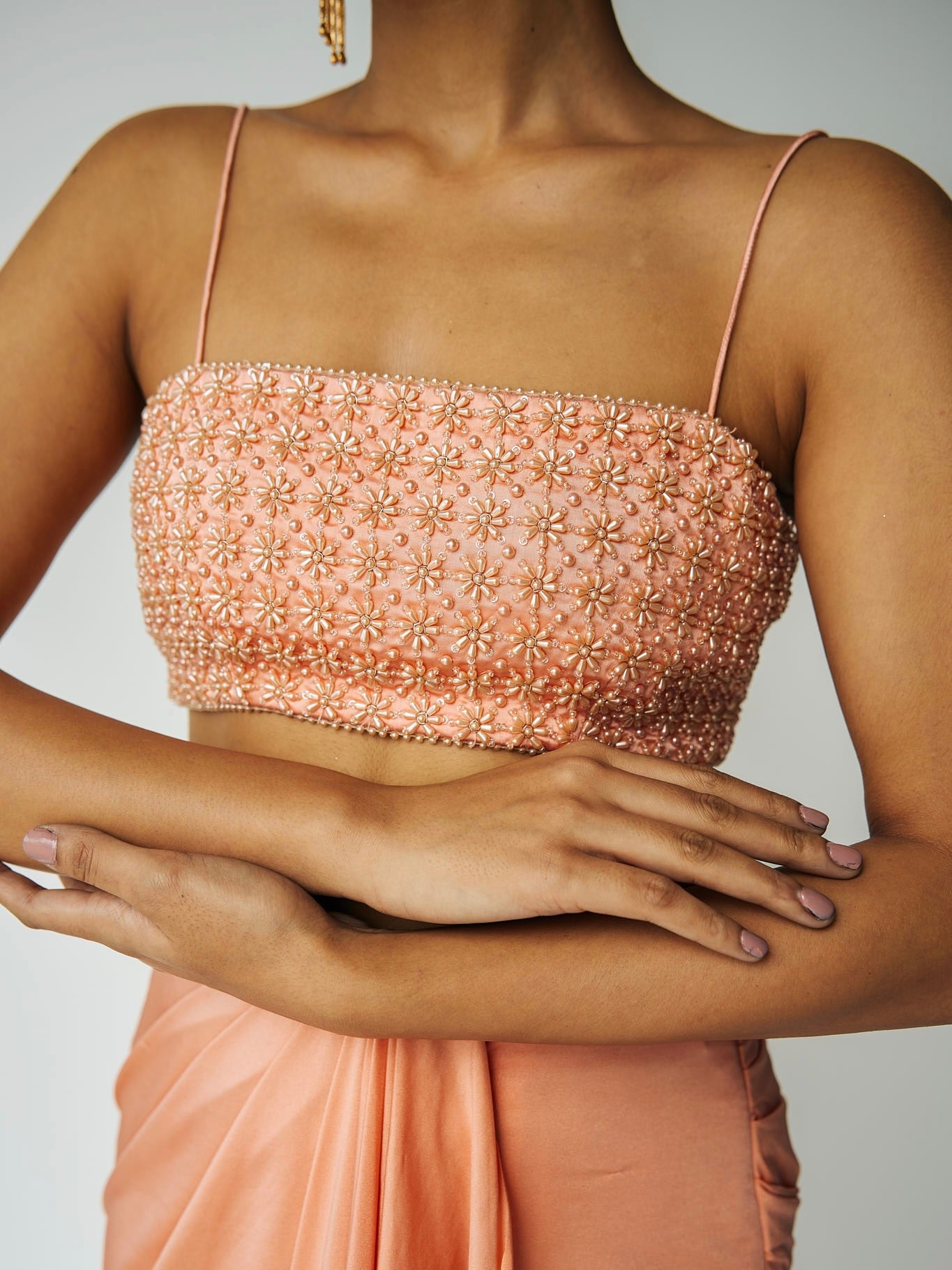 The Pearl Set features a hand embroidered pearl top, gathered skirt and skinny dupatta with pearl detailing.