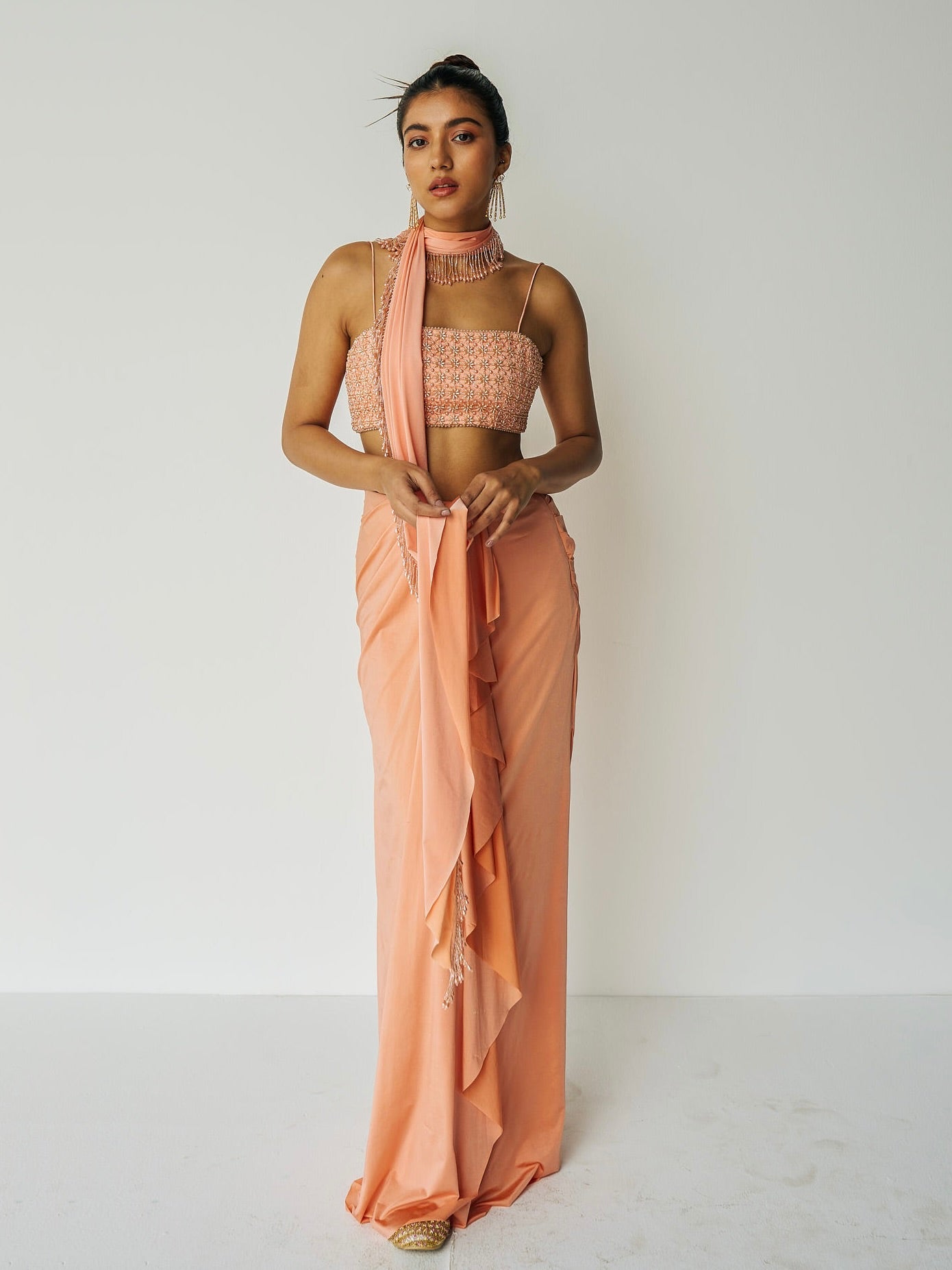 The Pearl Set features a hand embroidered pearl top, gathered skirt and skinny dupatta with pearl detailing.