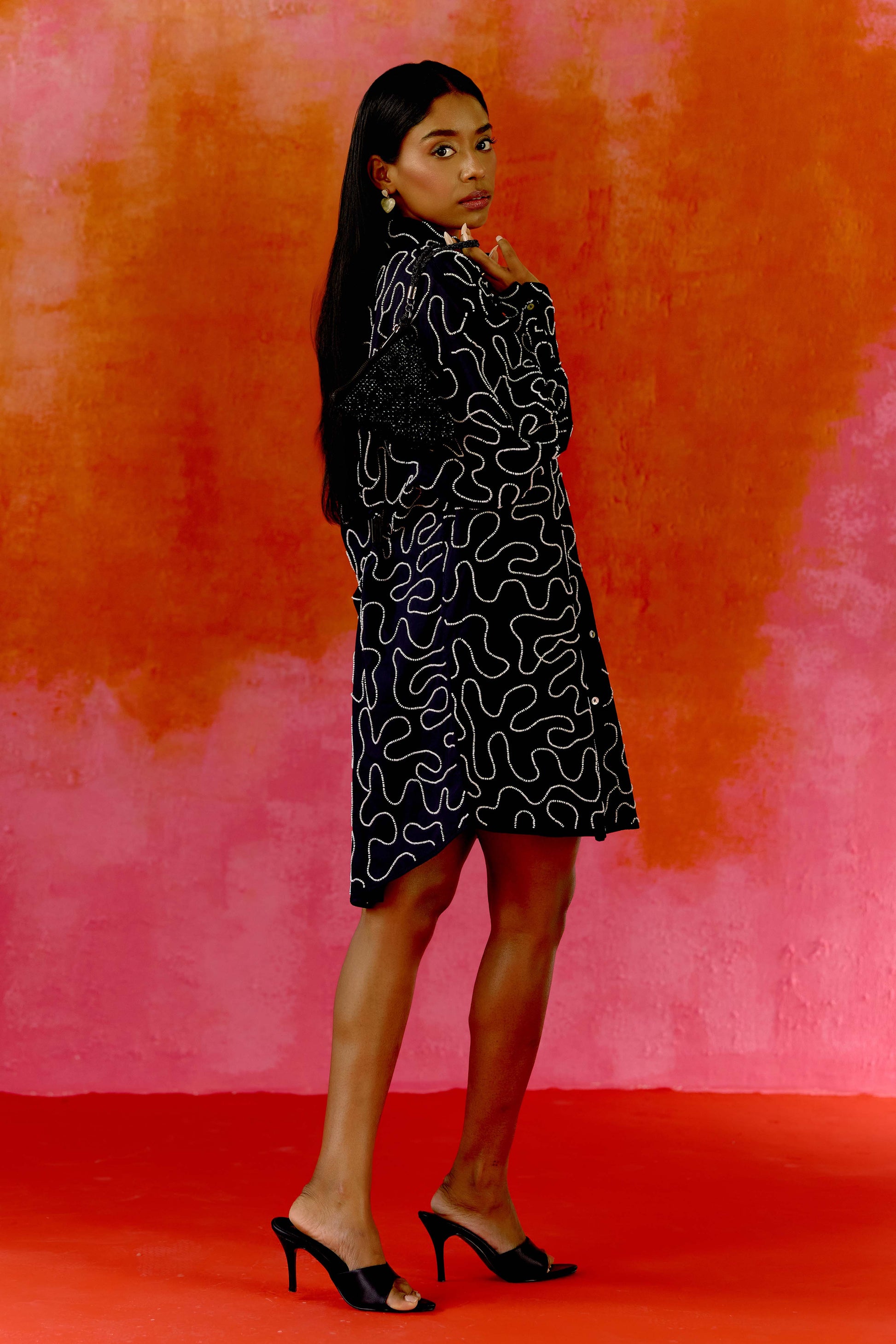 The Kira Dress is our twist on the classic shirt dress—tailored in silhouette but detailed with winding threadwork and subtle beading for just the right amount of drama. Made from soft 100% cotton and finished with contrast buttons, it's the kind of dress that works just as well with sneakers as it does with heels.
