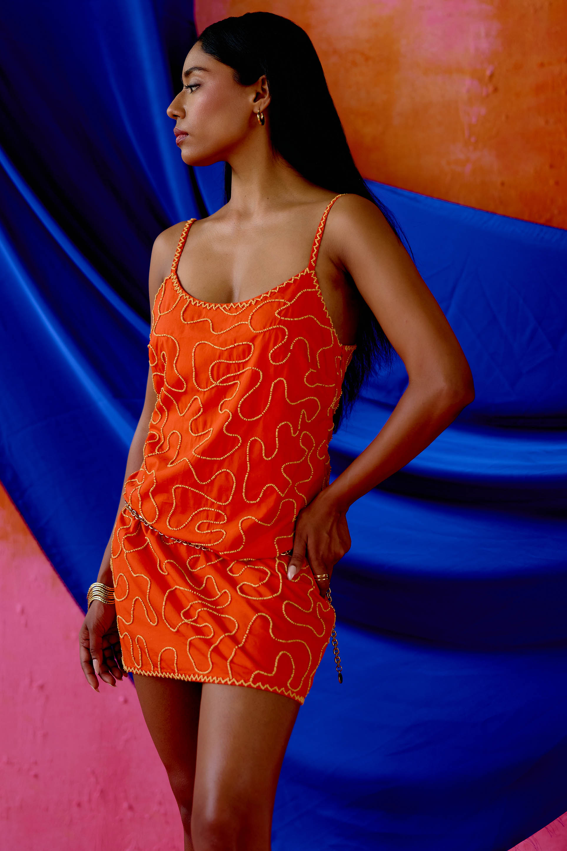 The Meera Dress is made from 100% cotton and features abstract, hand-beaded detailing that adds just the right amount of texture. With its vibrant orange hue and flattering mini silhouette, it’s an easy go-to for summer dinners, vacation nights, or whenever “subtle” just won’t cut it.