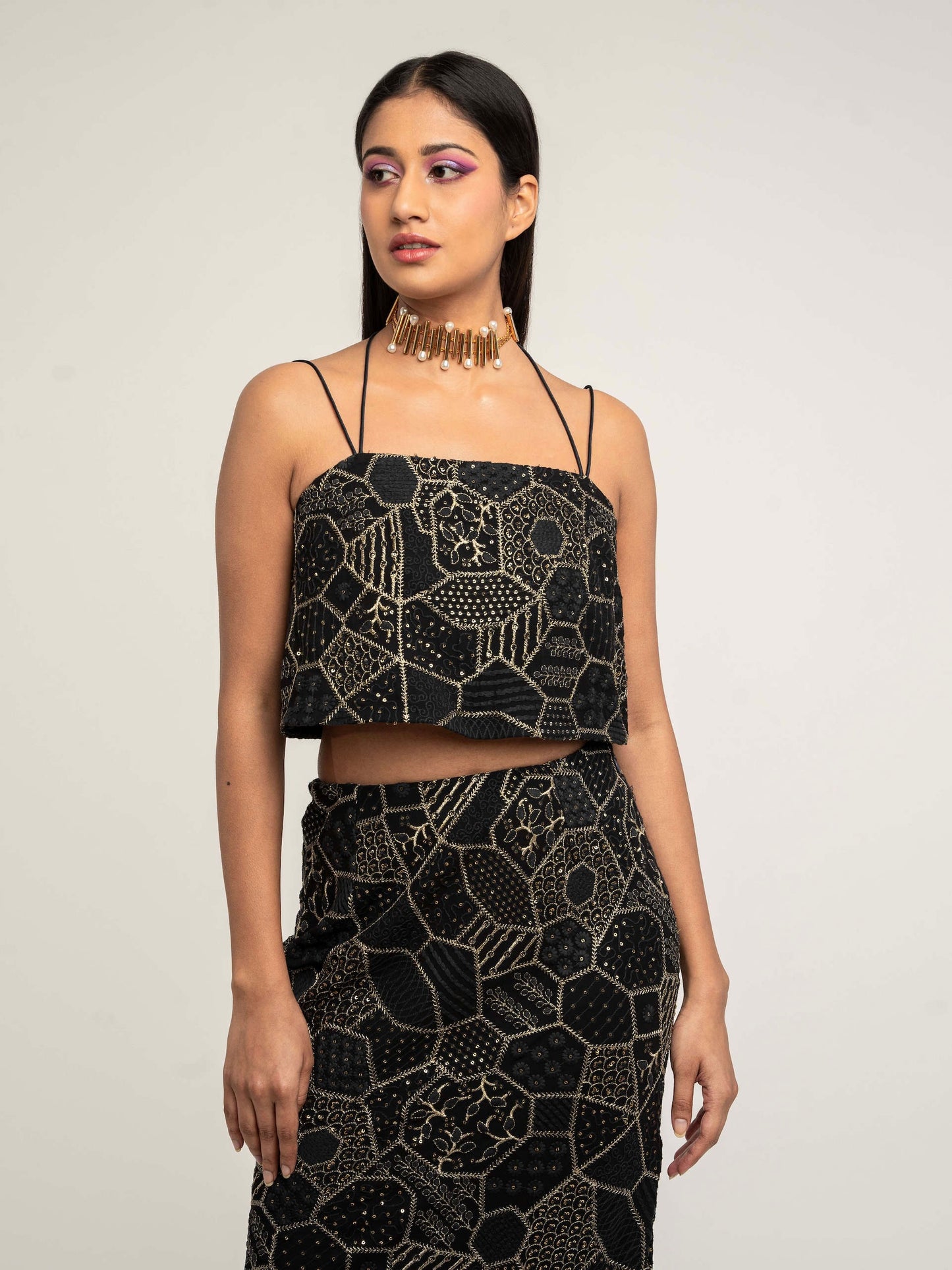 The Amara consists of a high-waisted, elastic waistband skirt with a spaghetti-strapped blouse and a skinny dupatta.  