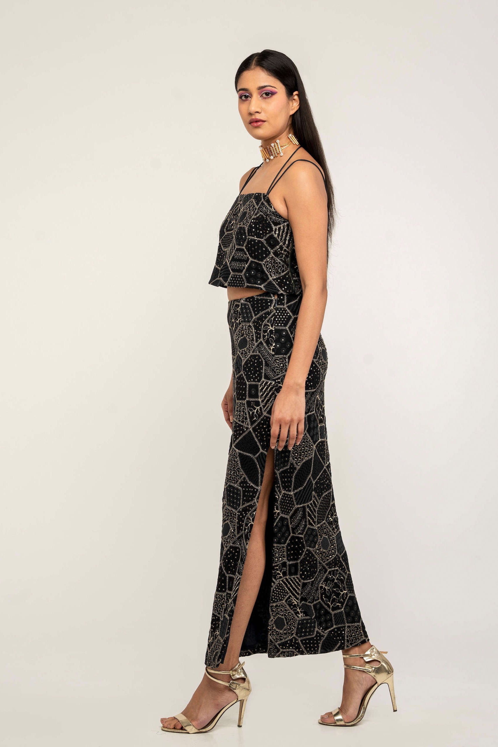 The Amara consists of a high-waisted, elastic waistband skirt with a spaghetti-strapped blouse and a skinny dupatta.