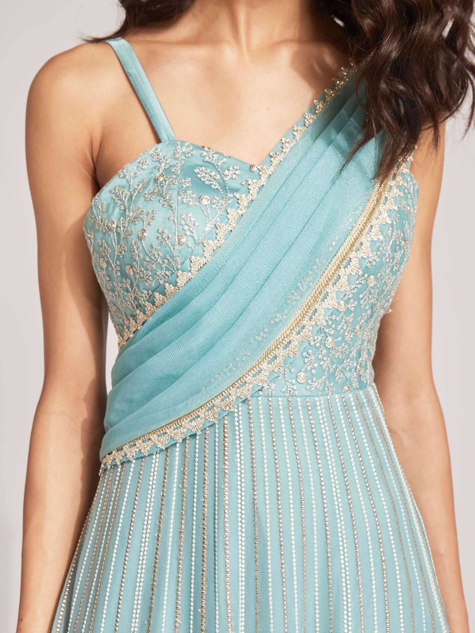 The Anjali Anarkali features metallic layered embroidery and is paired with an attached dupatta (so you can't lose or trip on it).