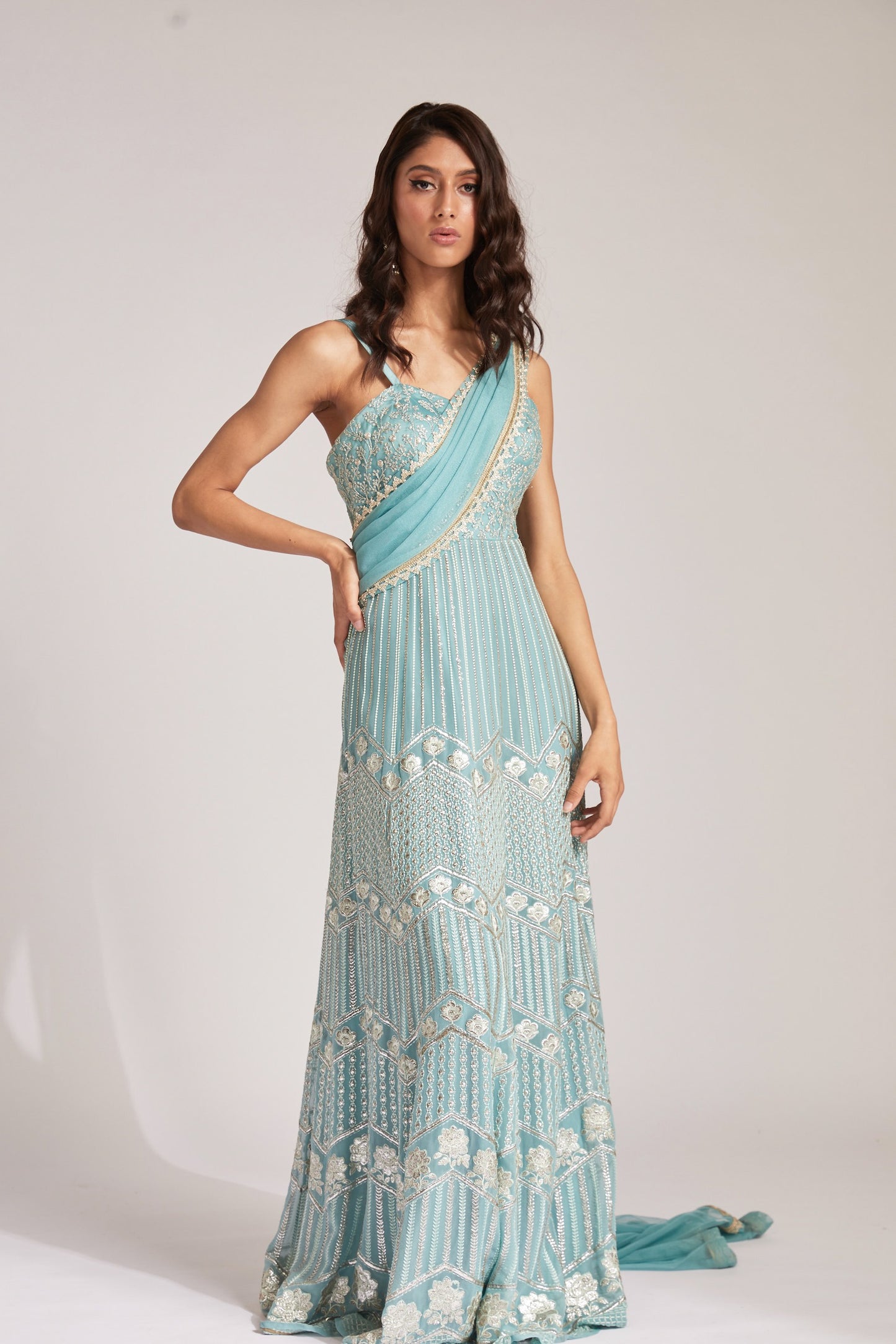 The Anjali Anarkali features metallic layered embroidery and is paired with an attached dupatta (so you can't lose or trip on it).