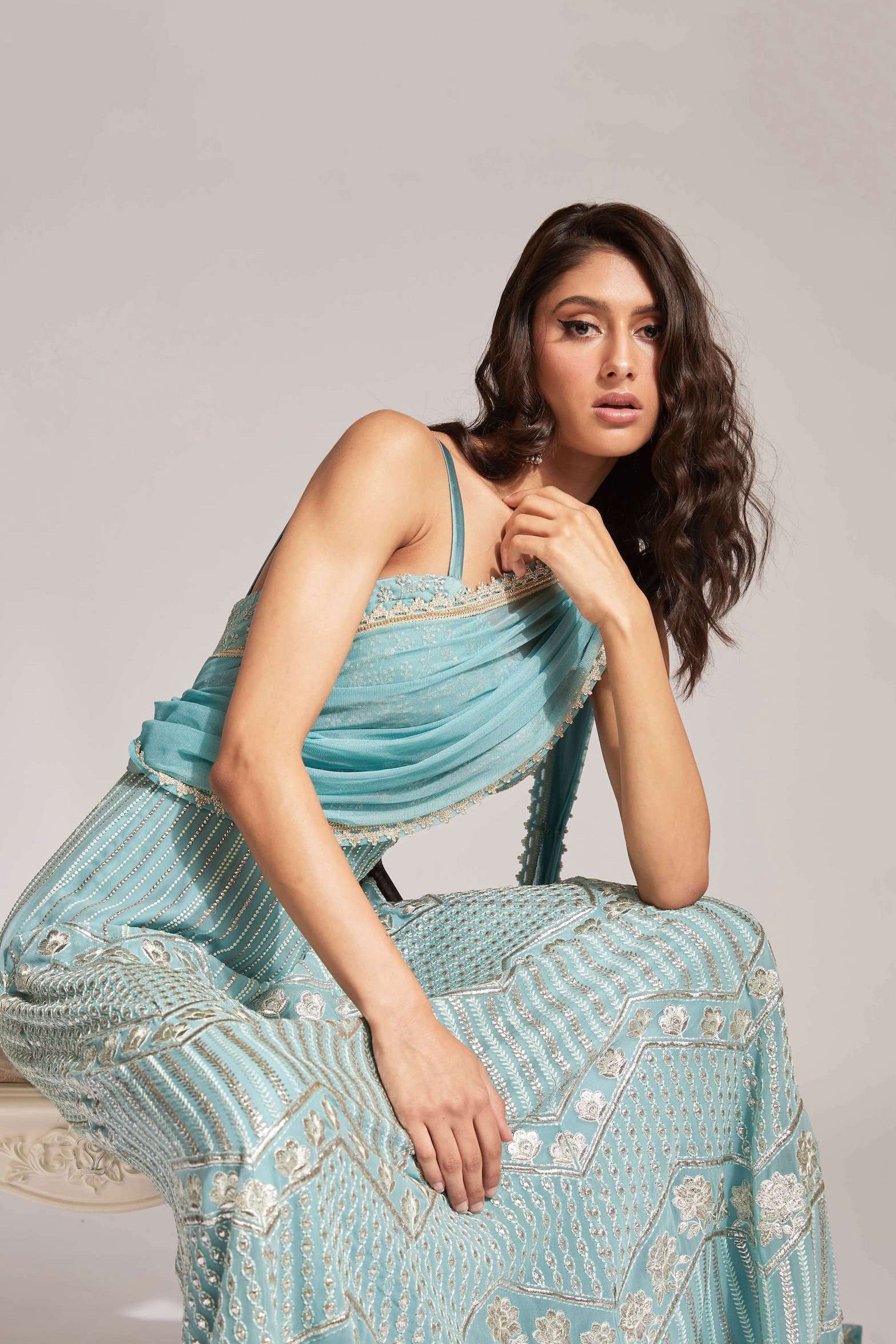 The Anjali Anarkali features metallic layered embroidery and is paired with an attached dupatta (so you can't lose or trip on it).