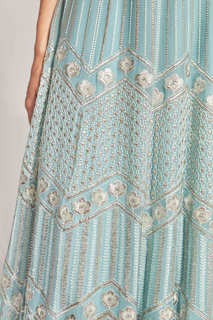 The Anjali Anarkali features metallic layered embroidery and is paired with an attached dupatta (so you can't lose or trip on it).