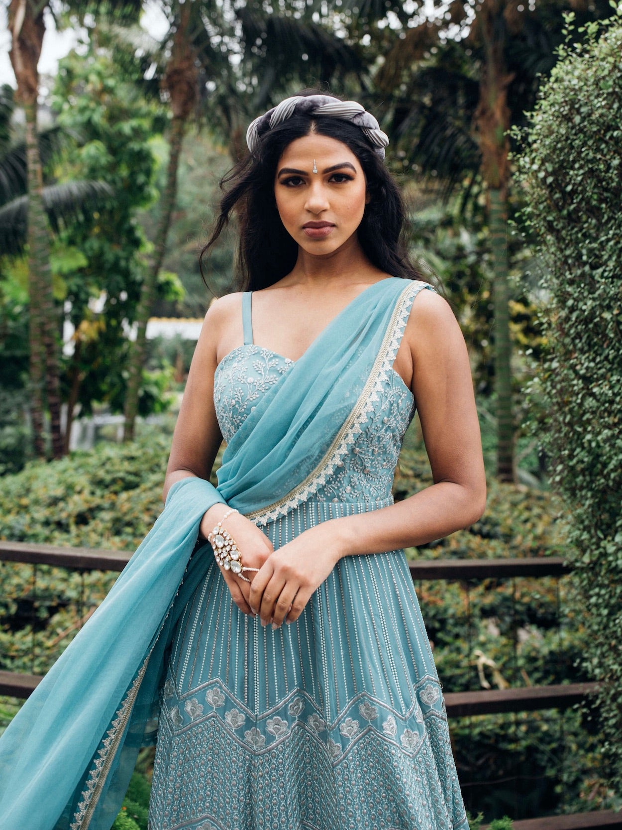 The Anjali Anarkali features metallic layered embroidery and is paired with an attached dupatta (so you can't lose or trip on it).