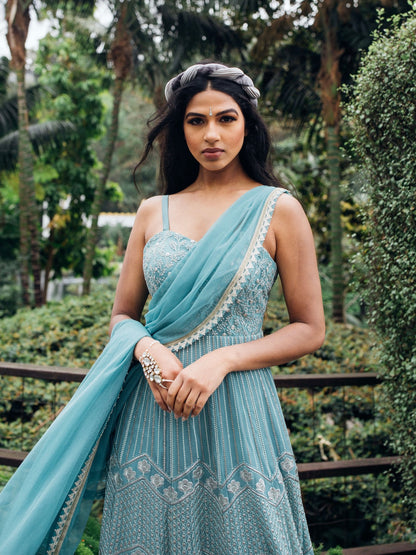 The Anjali Anarkali features metallic layered embroidery and is paired with an attached dupatta (so you can't lose or trip on it).