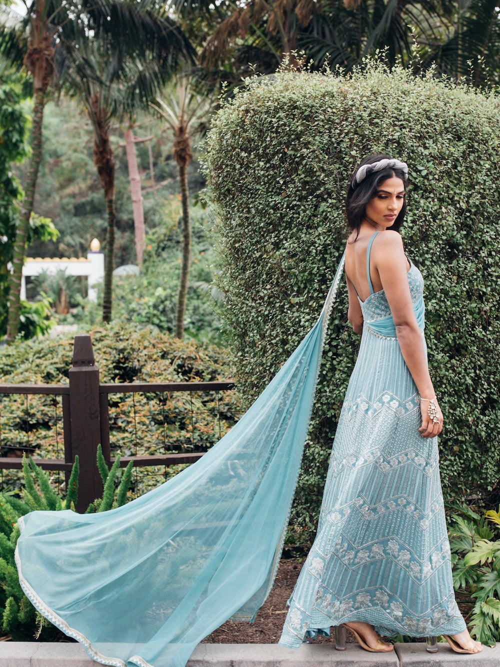 The Anjali Anarkali features metallic layered embroidery and is paired with an attached dupatta (so you can't lose or trip on it).