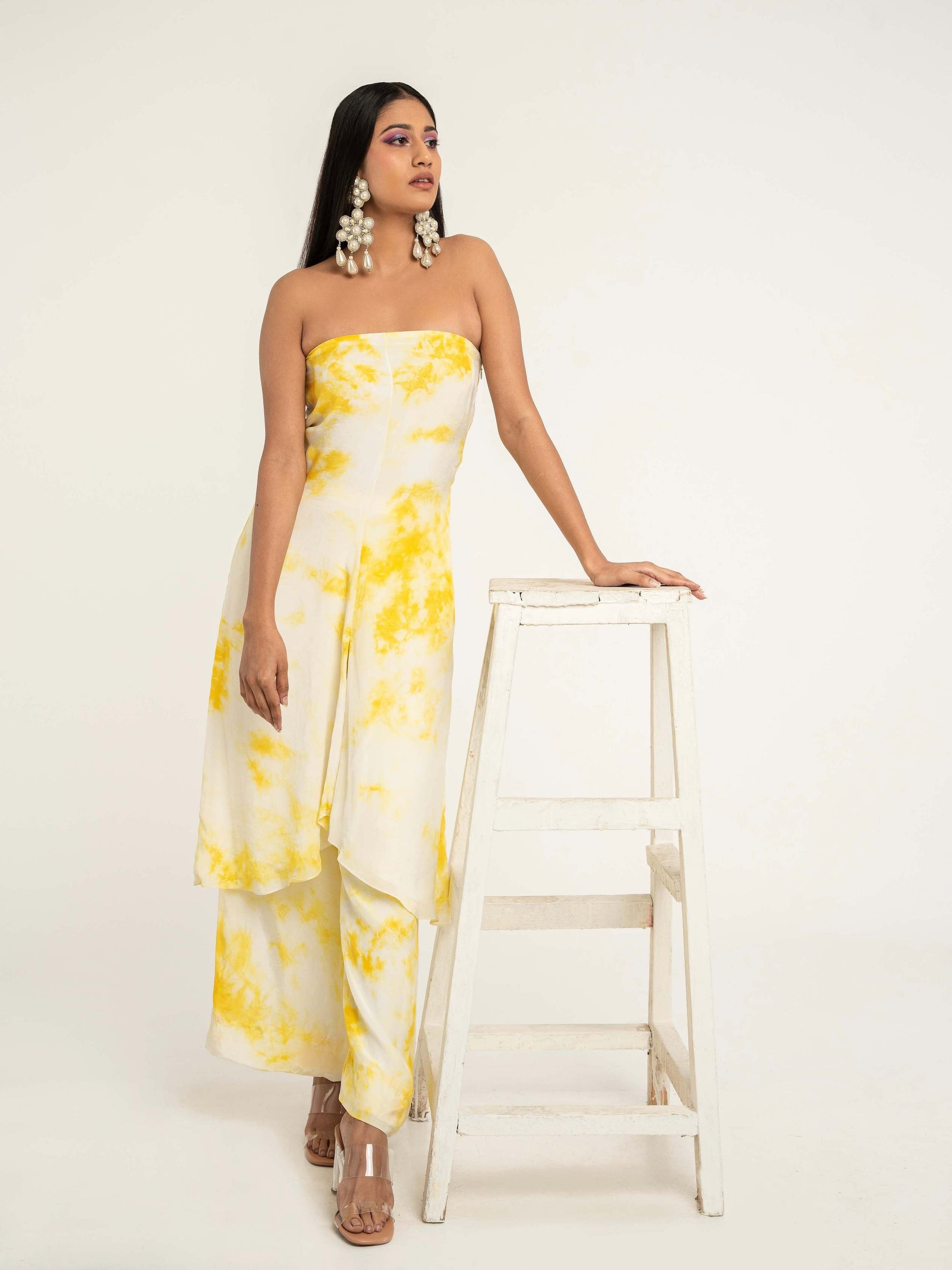 The Haldi Set consists of a strapless dress with high-waisted, elastic pants. 