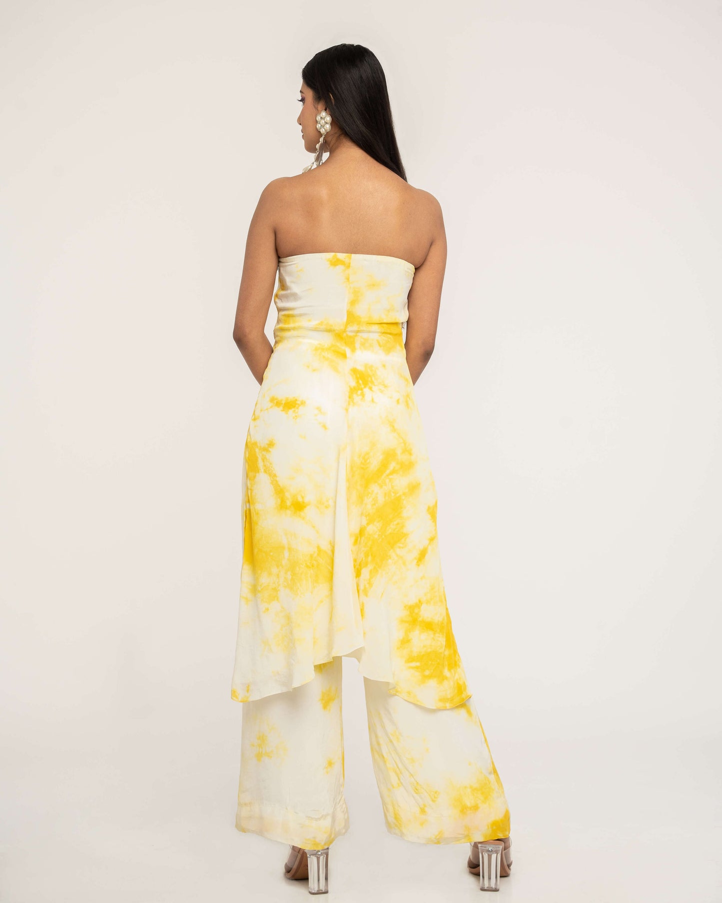 The Haldi Set consists of a strapless dress with high-waisted, elastic pants. 