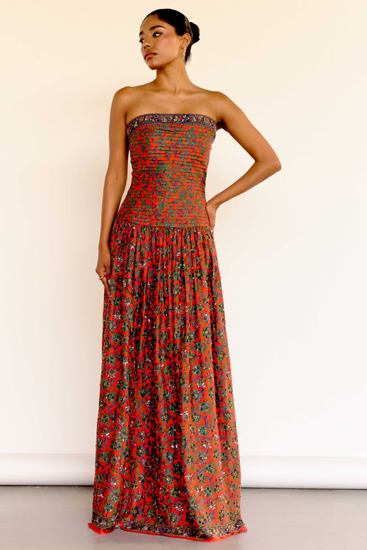 This limited-edition version of the Maya Dress features hand-beaded embellishments that bring new dimension to the vintage-inspired floral print. Each bead is carefully placed by artisans to highlight the soft pleating on the bodice and the dreamy movement of the gathered skirt.&nbsp;