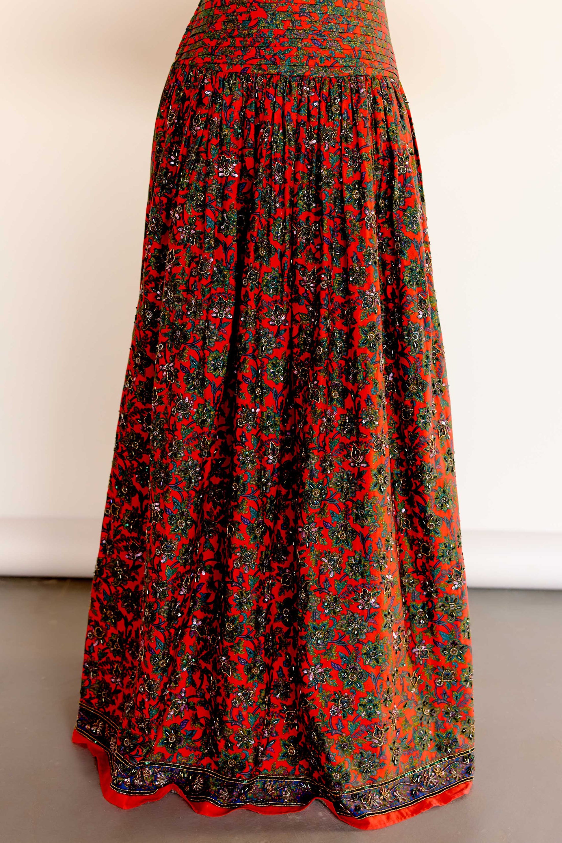 This limited-edition version of the Maya Dress features hand-beaded embellishments that bring new dimension to the vintage-inspired floral print. Each bead is carefully placed by artisans to highlight the soft pleating on the bodice and the dreamy movement of the gathered skirt.&nbsp;