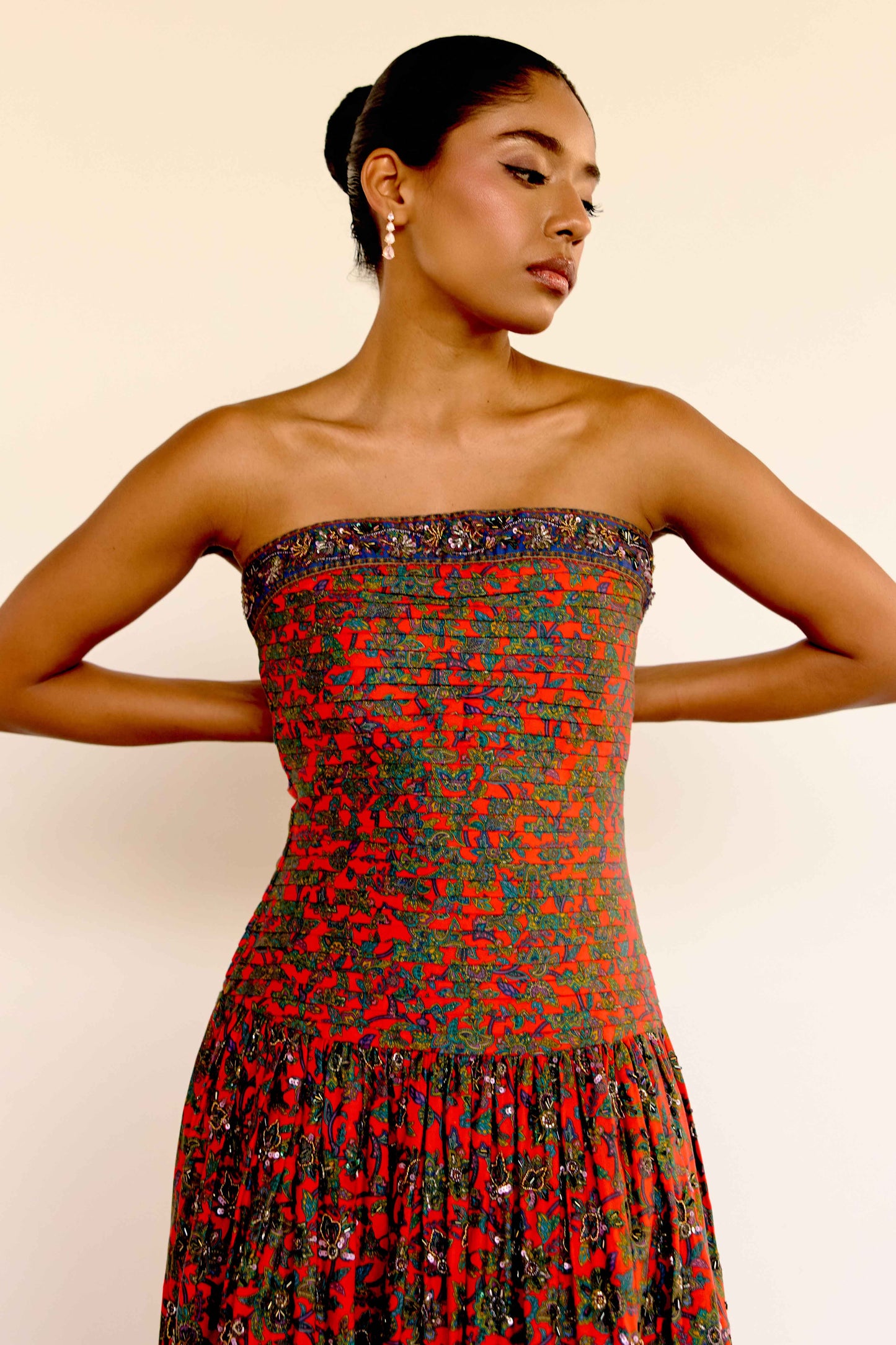 This limited-edition version of the Maya Dress features hand-beaded embellishments that bring new dimension to the vintage-inspired floral print. Each bead is carefully placed by artisans to highlight the soft pleating on the bodice and the dreamy movement of the gathered skirt.&nbsp;