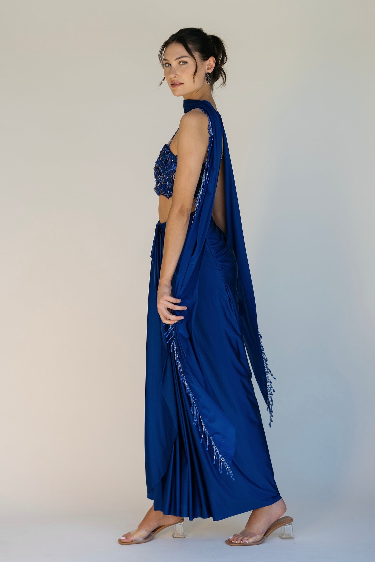 The Niki Set features a hand embroidered top, gathered skirt and skinny dupatta with pearl detailing.