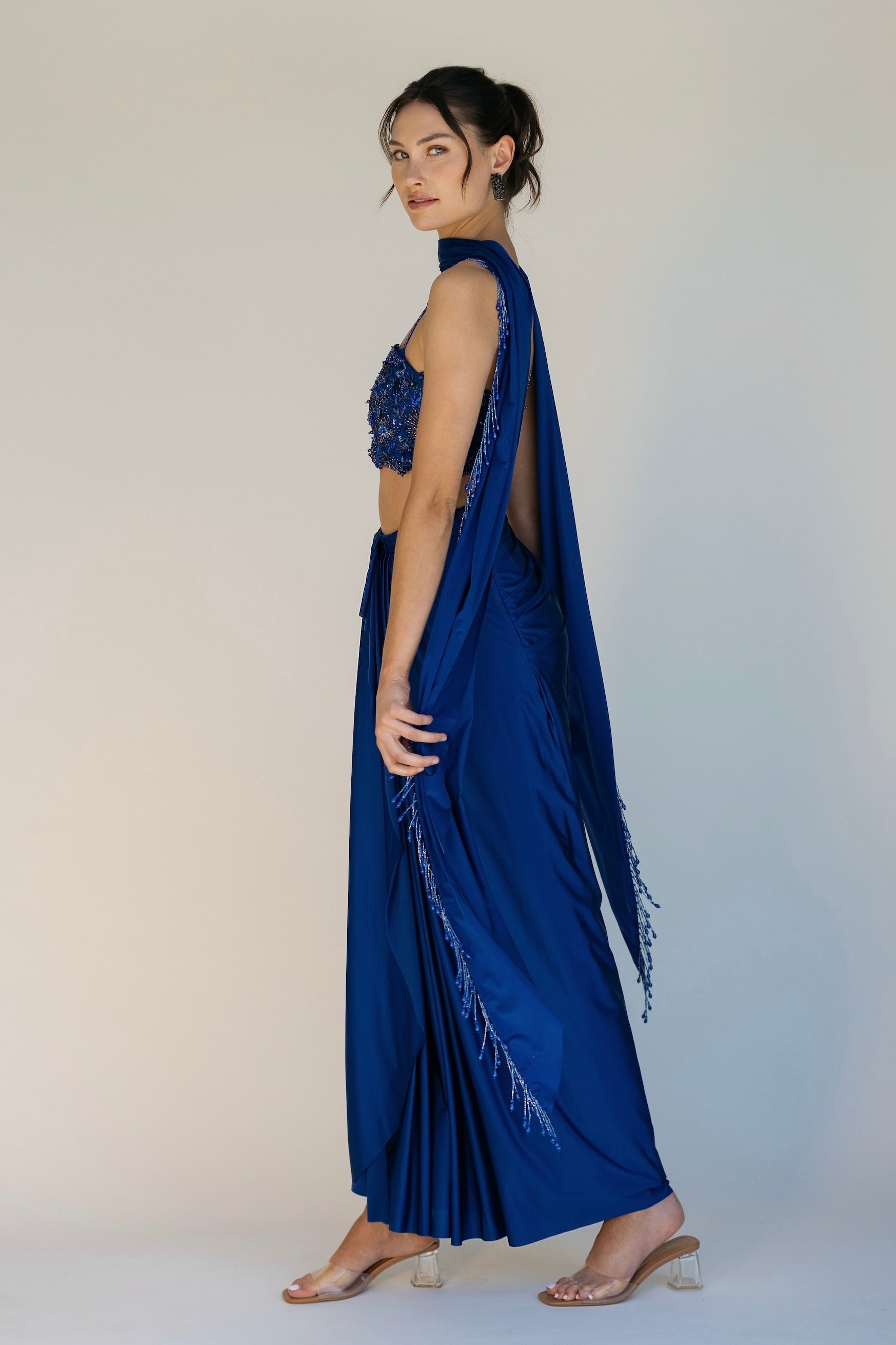 The Niki Set features a hand embroidered top, gathered skirt and skinny dupatta with pearl detailing.
