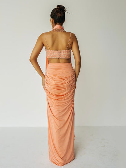 The Pearl Set features a hand embroidered pearl top, gathered skirt and skinny dupatta with pearl detailing.
