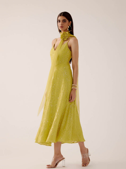 The Zara Dress is a midi-length dress with delicate sequin work throughout. The dress comes with a skinny dupatta and a detachable, handmade rosette clip.
