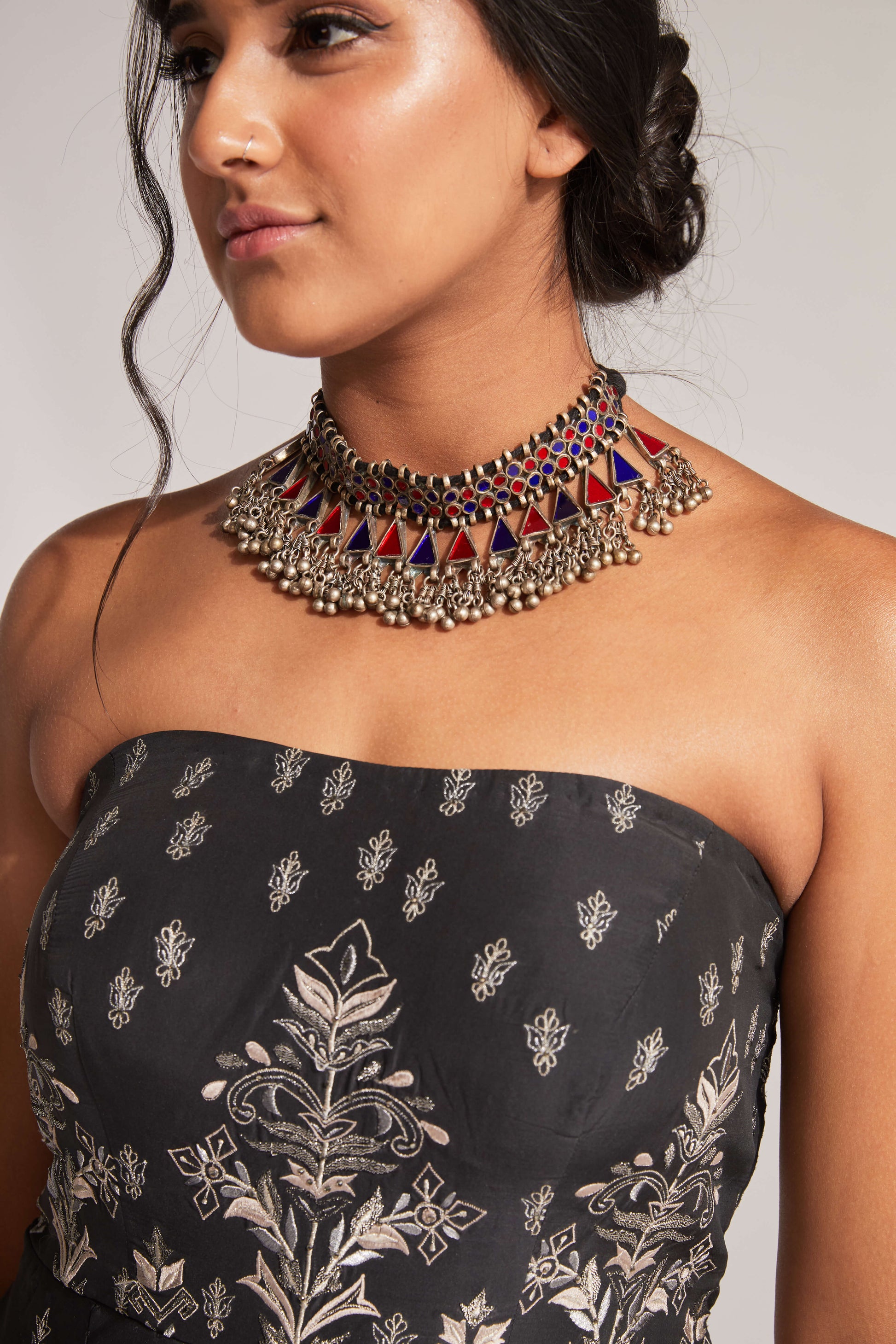 Blue tea length dress with zari embroidery close-up