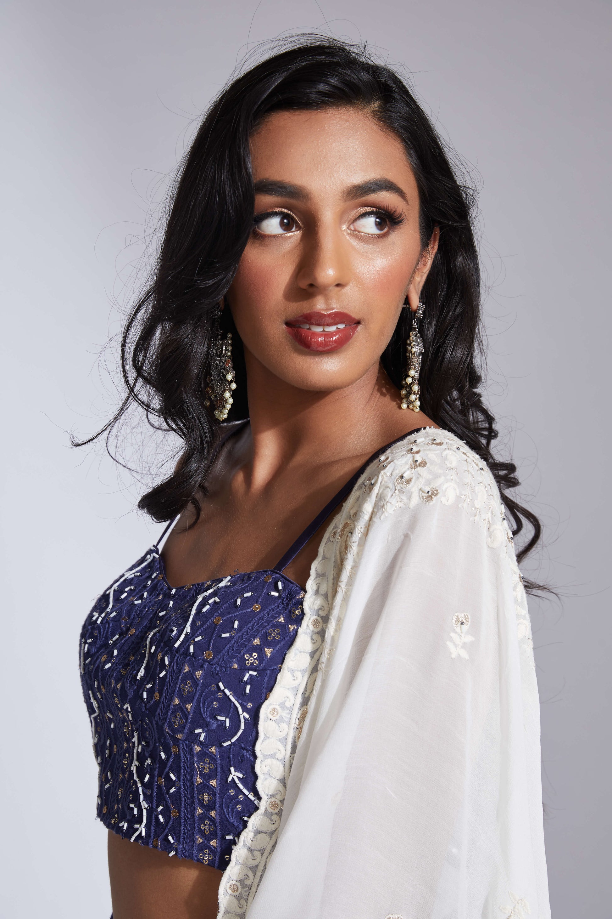 Lucknowi/chikankari blue lehenga with cutdana highlights and scallop dupatta